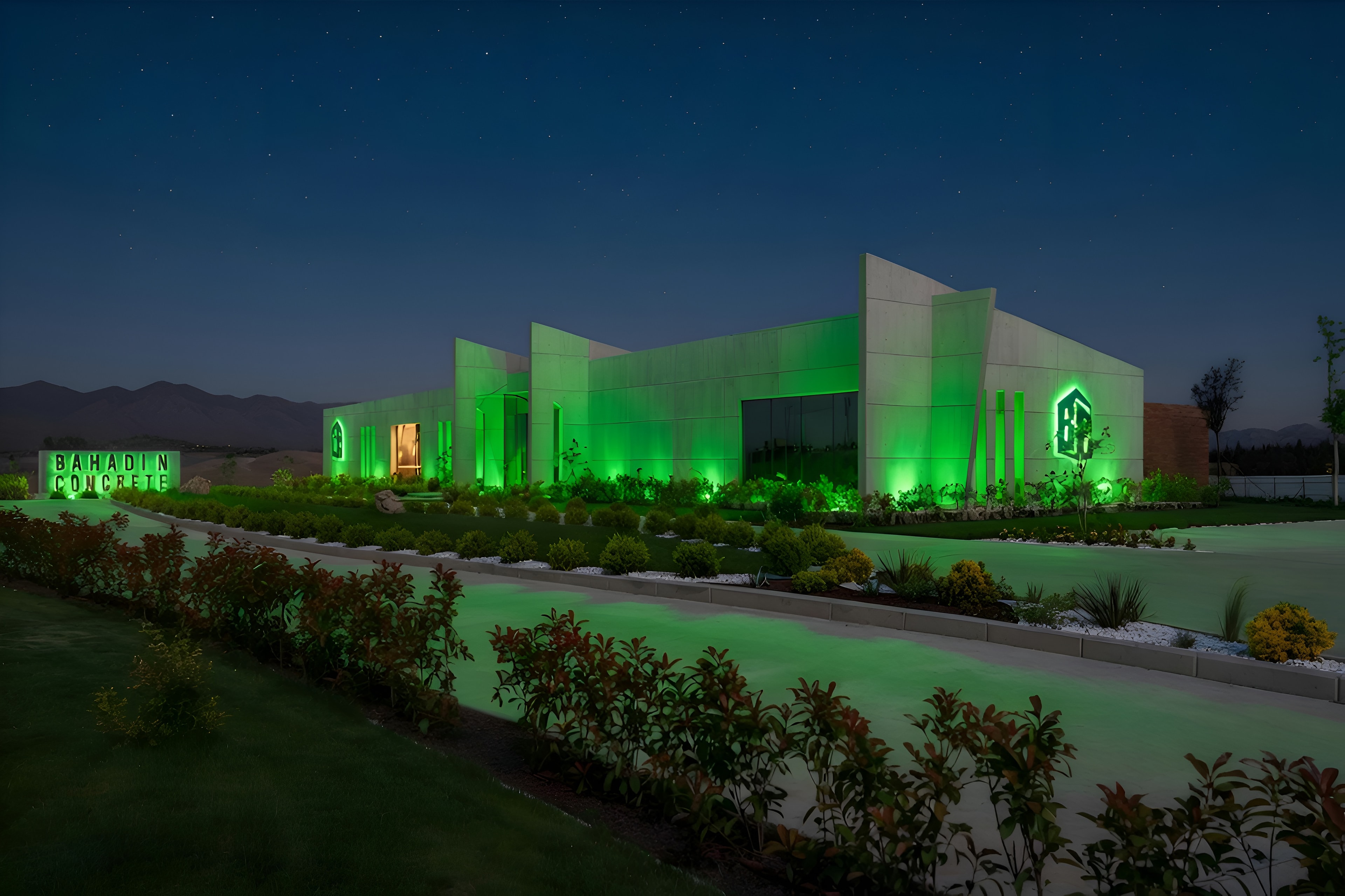 The Bahadin Concrete building under green light at night