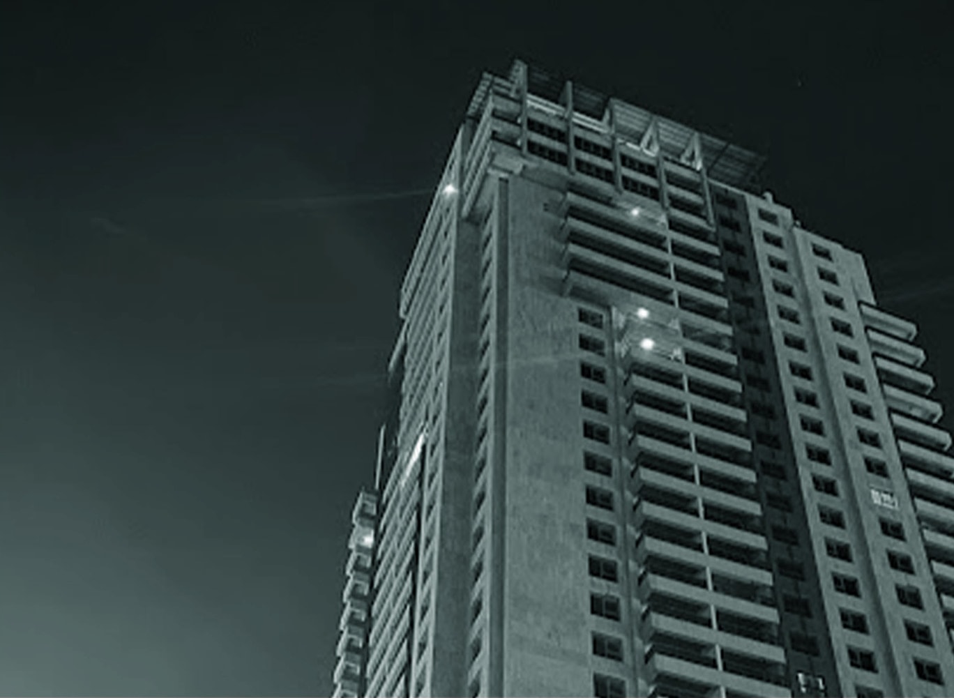 A Jaff Towers residential tower against the sky