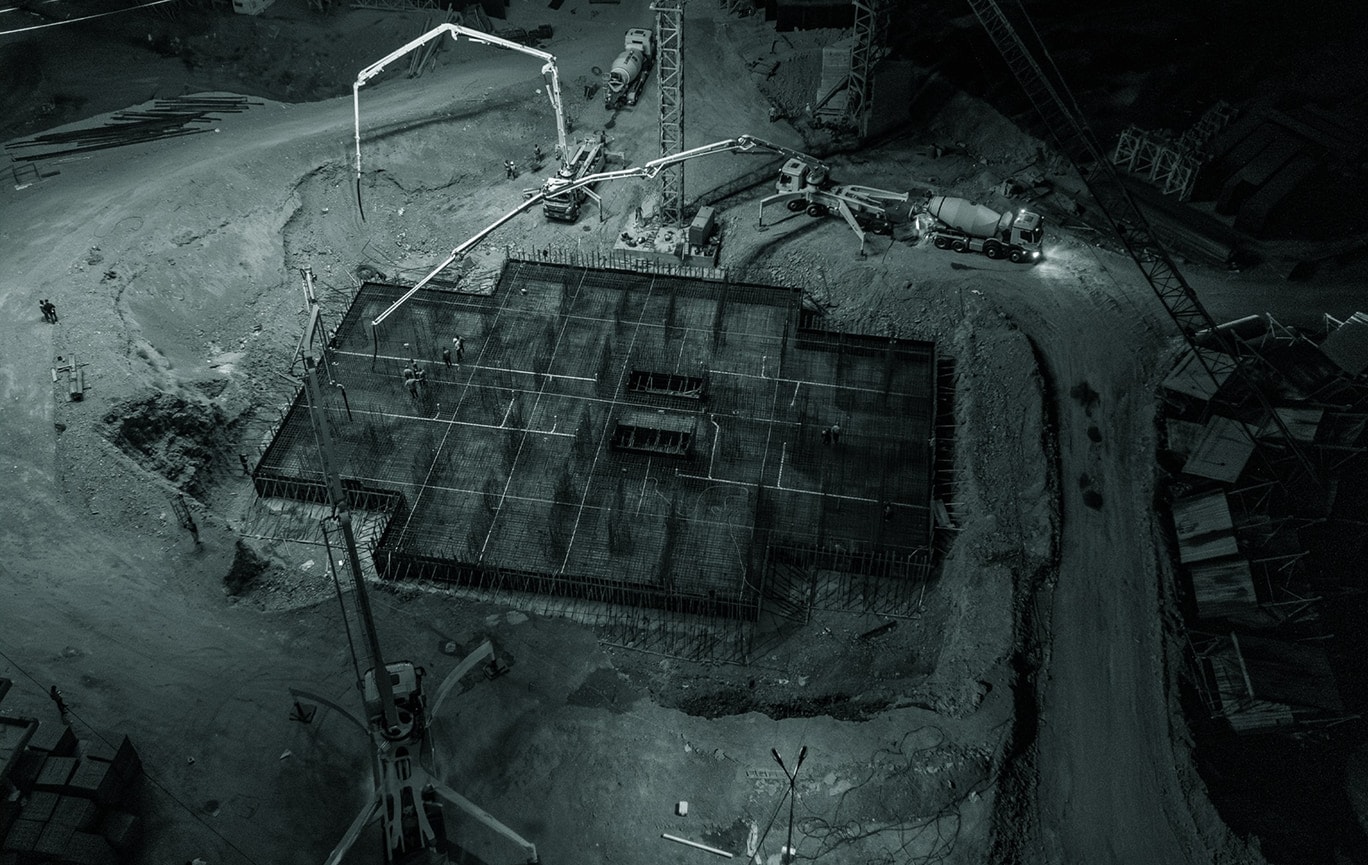 Marina Towers: a foundation pour at night, seen from above