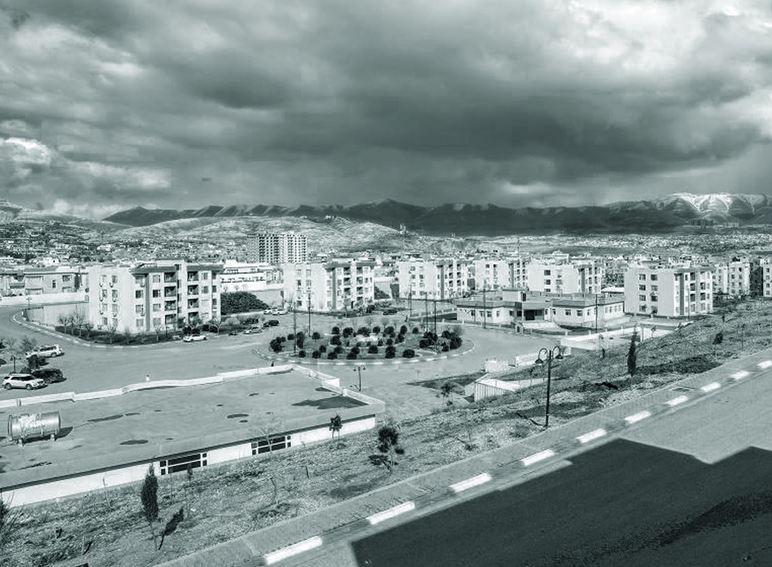 Nali City: rows of residential buildings under a cloudy sky